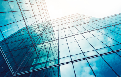 glass skyscraper with building reflection