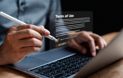 person on laptop checking off an onscreen virtual display of a terms & conditions form