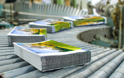 printed materials moving along a conveyor belt